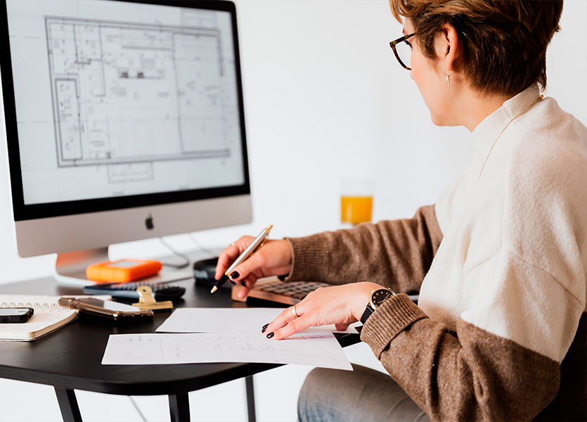 Resident working efficiently in a modern office setup within a Rockcliffe rental condo, reflecting a perfect work-life balance.